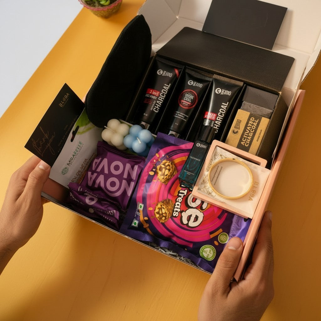 Hand holding opened box of The Alfa Glow Grooming & Self-Care Gift Hamper For Men