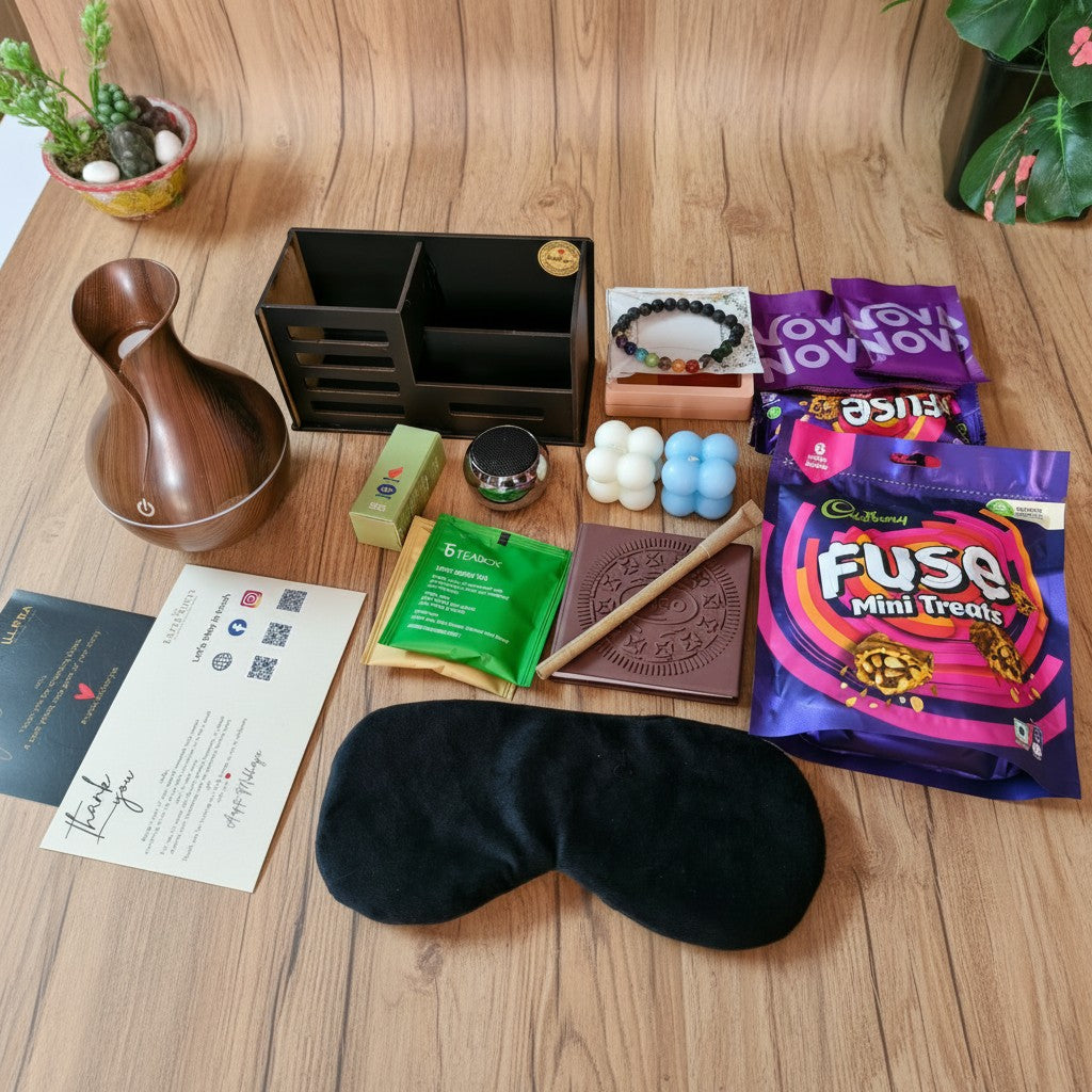 Close-up of Mindful Momentum Wellness & Productivity Gift Hamper for Men on a wooden surface