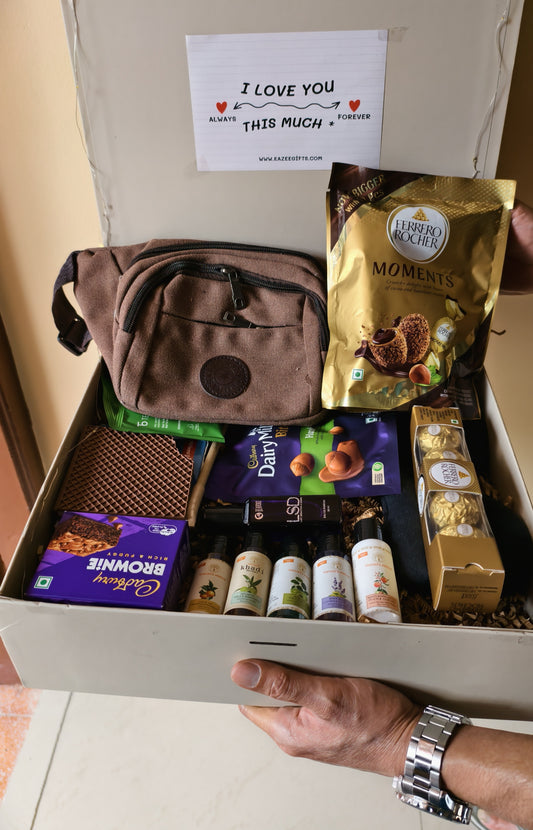 Hand holding The Urban Voyager Travel Care Gift Hamper For Men