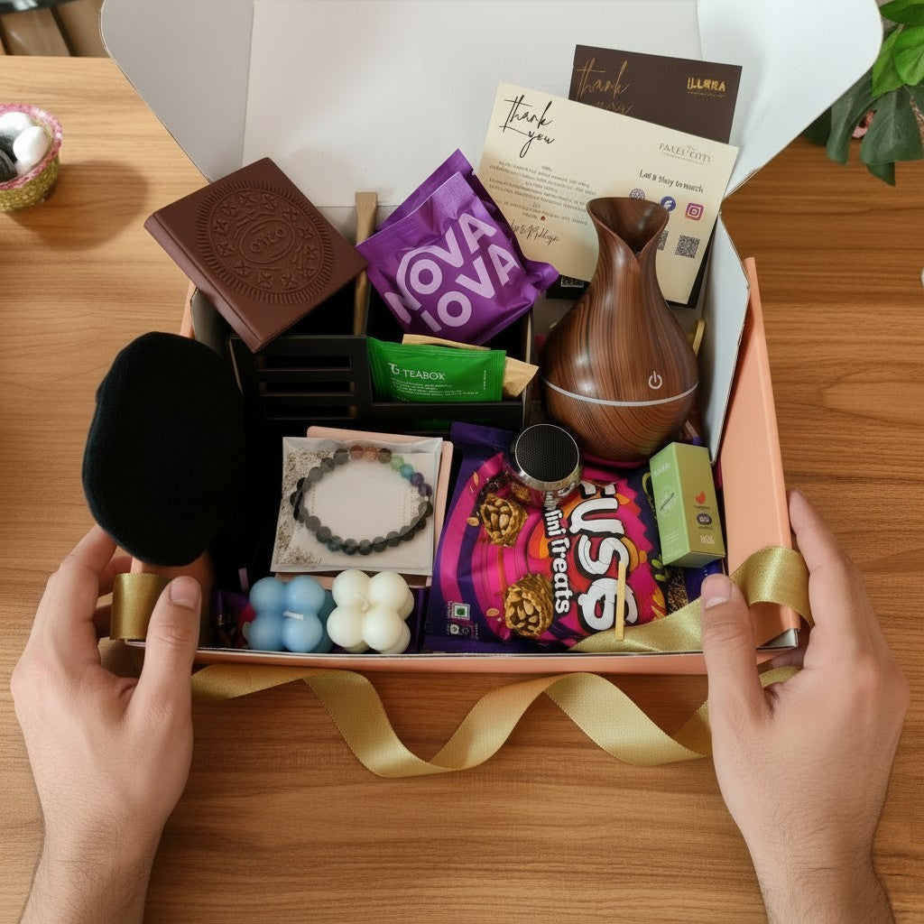 Hand holding Mindful Momentum Wellness & Productivity Gift Hamper for Men