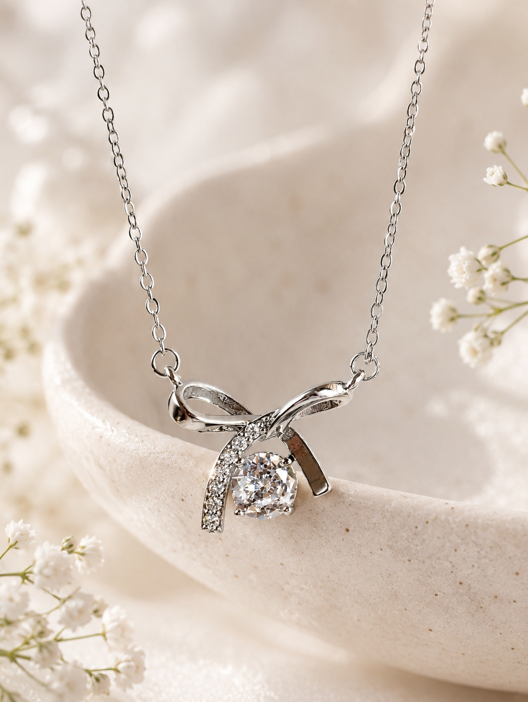 Aethel Silver Plated Twisted Infinity Necklace for Women with sparkling stones
