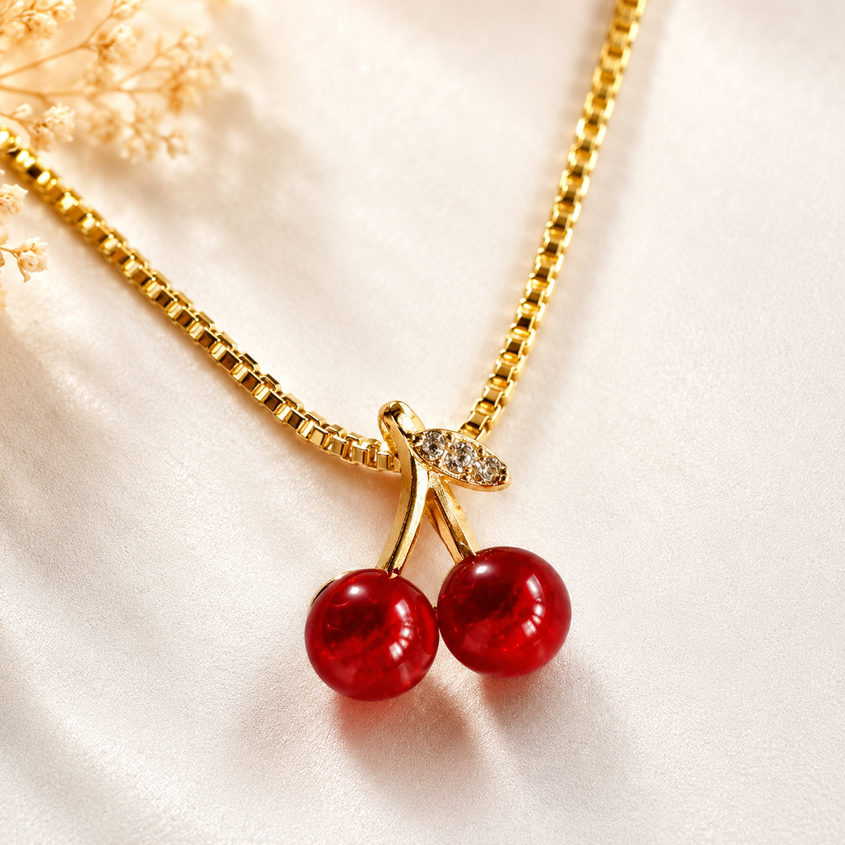 close up of cherry necklace