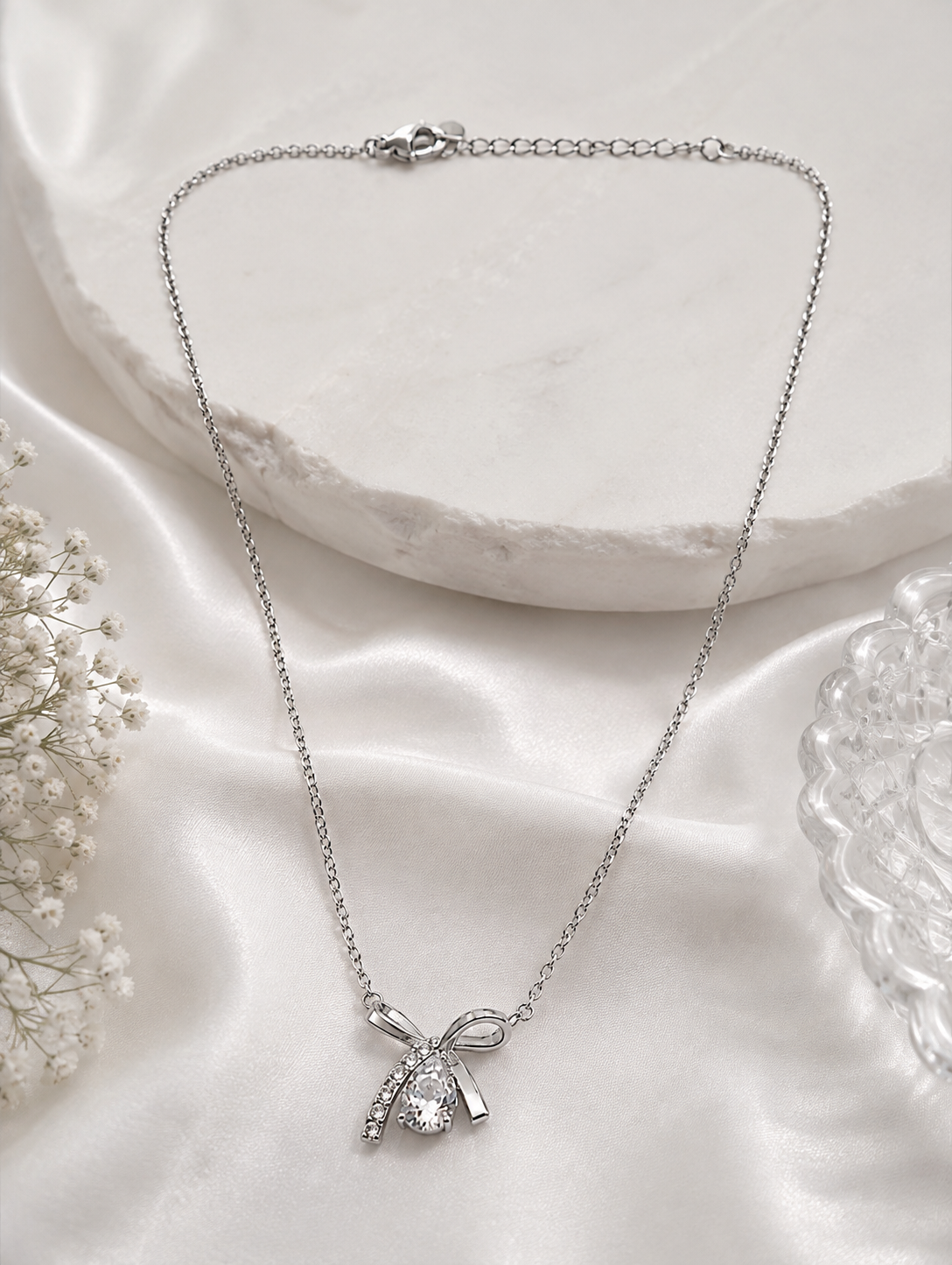 close up of Aethel Silver Plated Twisted Infinity Necklace for Women