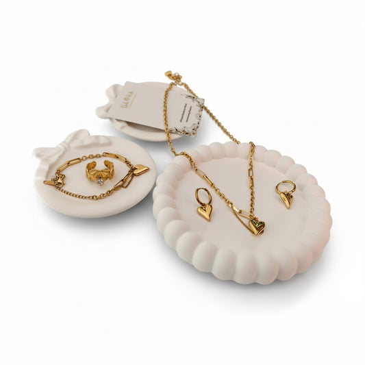 Golden Amour Heart Gold Plated Anti-Tarnish 4-Piece Jewellery Set for Women - Heart Necklace, Bracelet, Earrings, and Ring against a white background