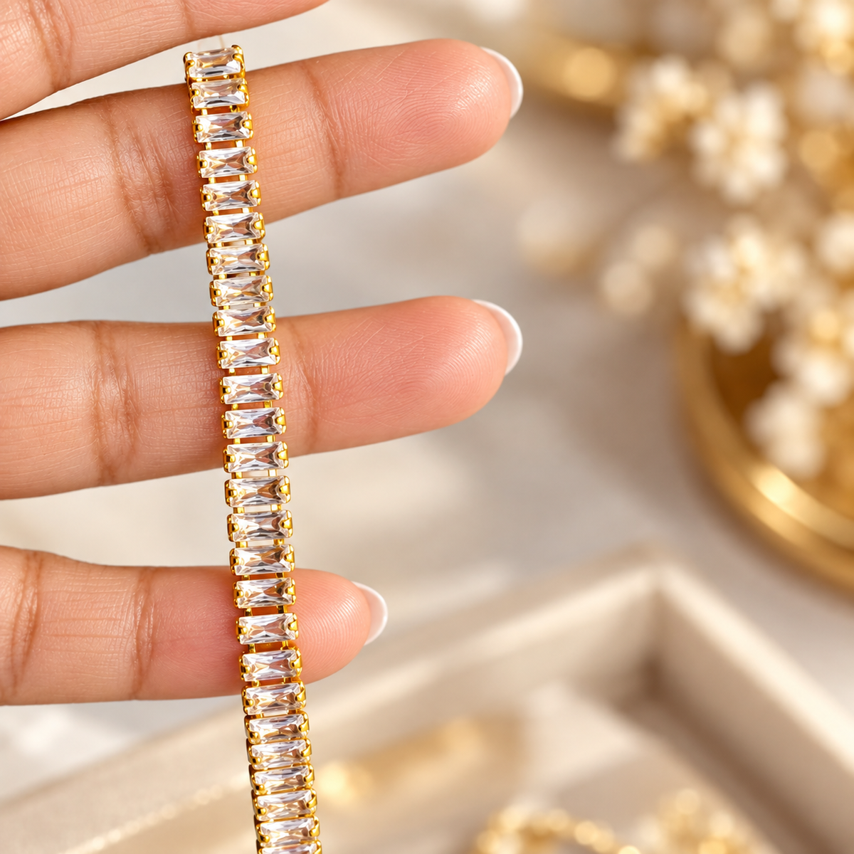 hand holding Gold Plated White Tennis Bracelet for Women