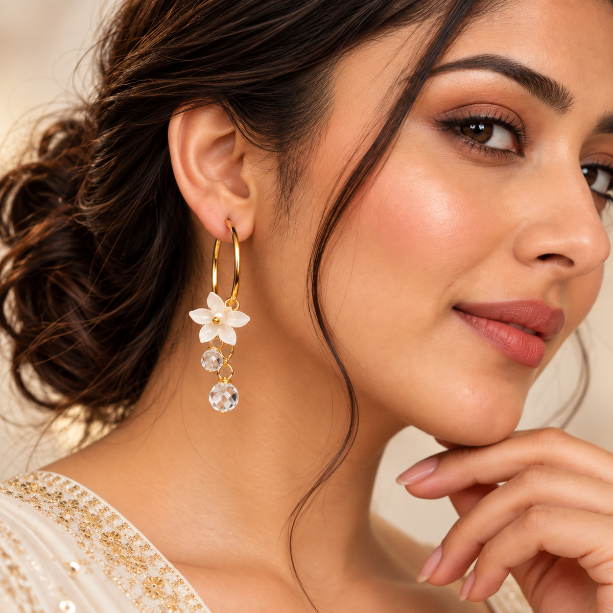 model wearing Gold Toned White Flower Crystal Bead Hoop Dangler Earrings for Women