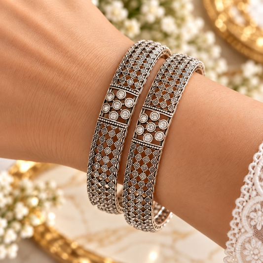 model wearing Oxidised Black & Silver Polished Stone Studded Ethnic Bangles for Women