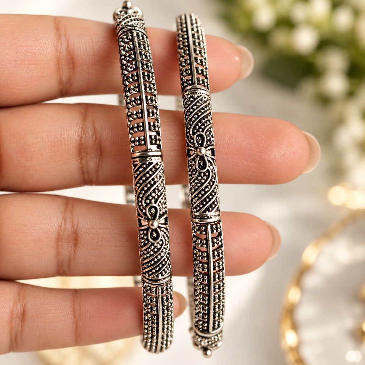 Oxidised Black & Silver Polished Floral Design Ethnic Bangles for Women close up