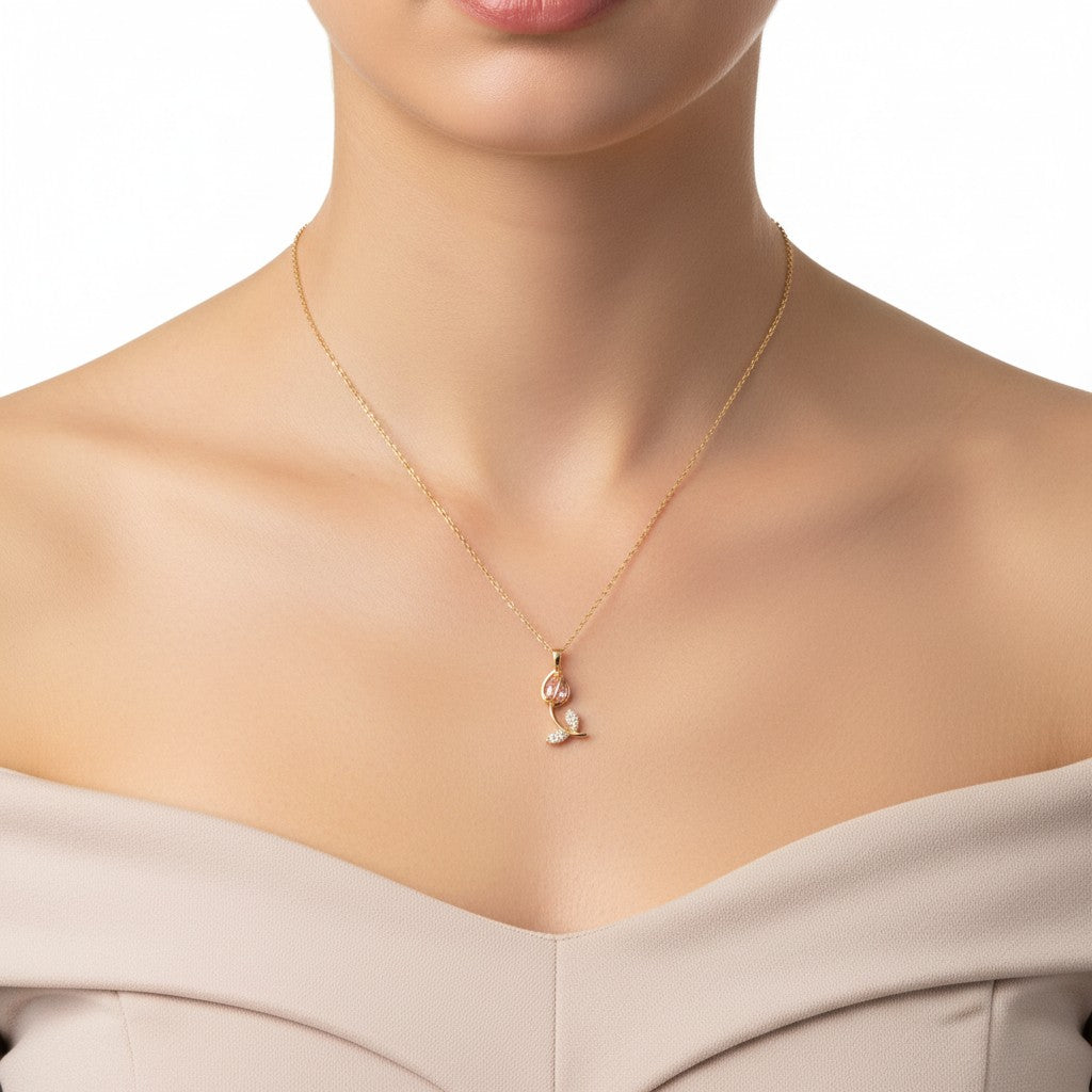 Anti-tarnish, gold-plated necklace with a Tulip pendant on a model against a white background