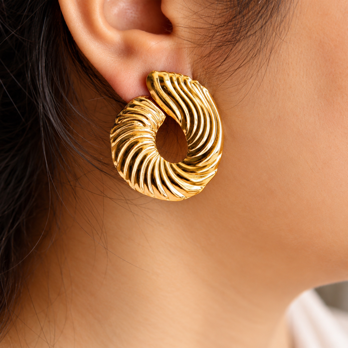 woman wearing Gold Toned Chunky Twisted Rope Circular Stud Earrings for Women
