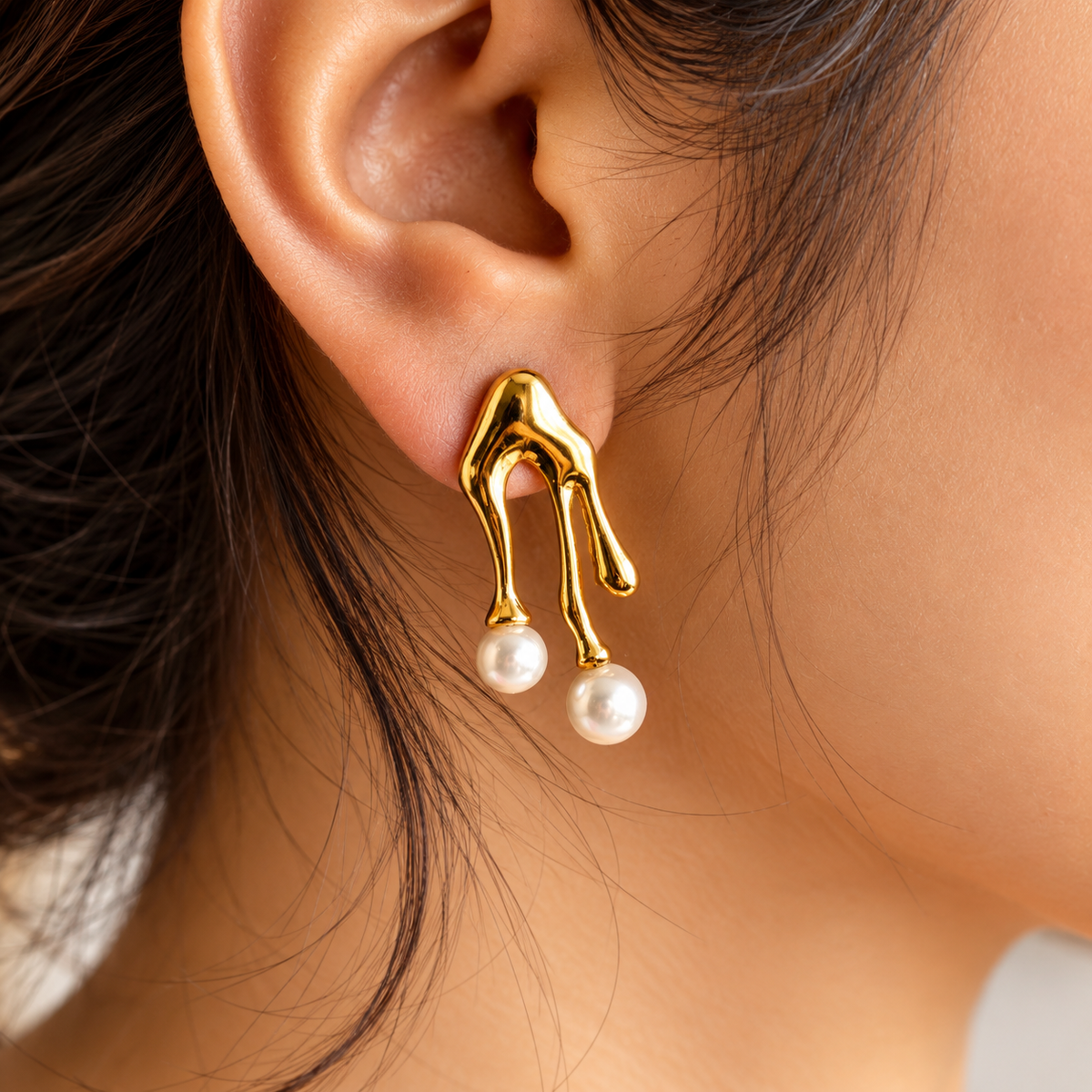 Woman wearing Gold Toned Three Finger Pearl Drop Chunky Stud Earrings for Women